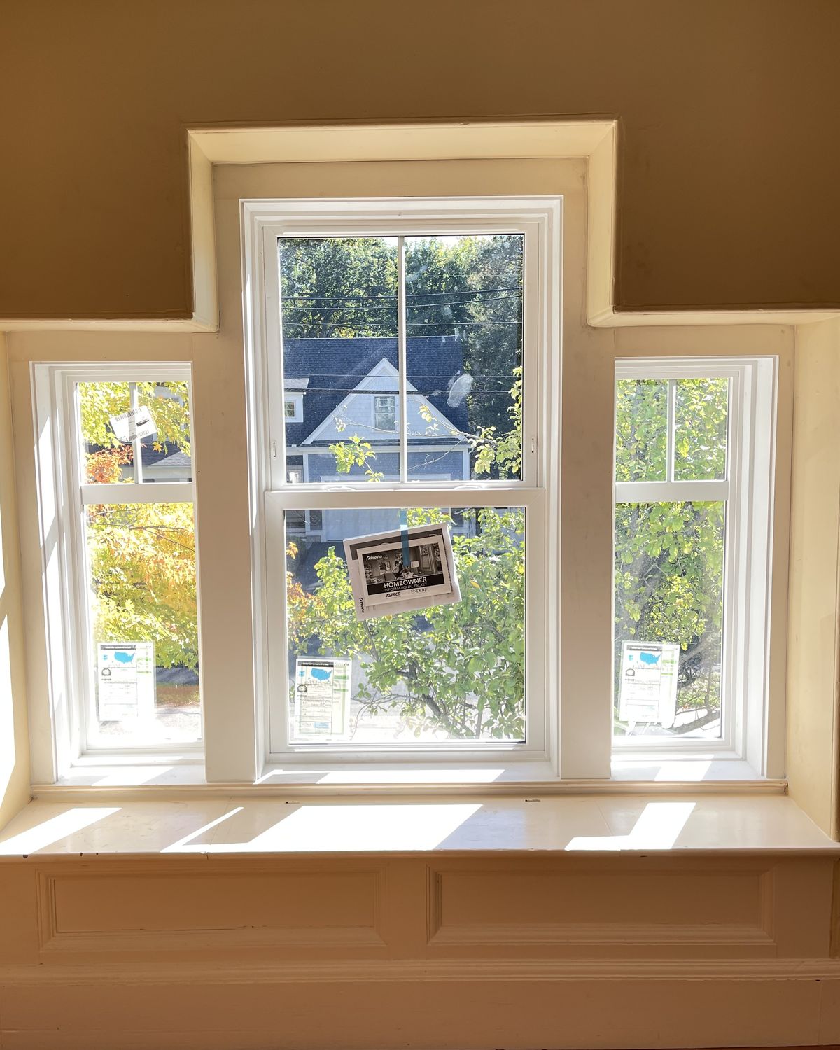 Same windows after the interior trim was rebuilt around the stepped opening